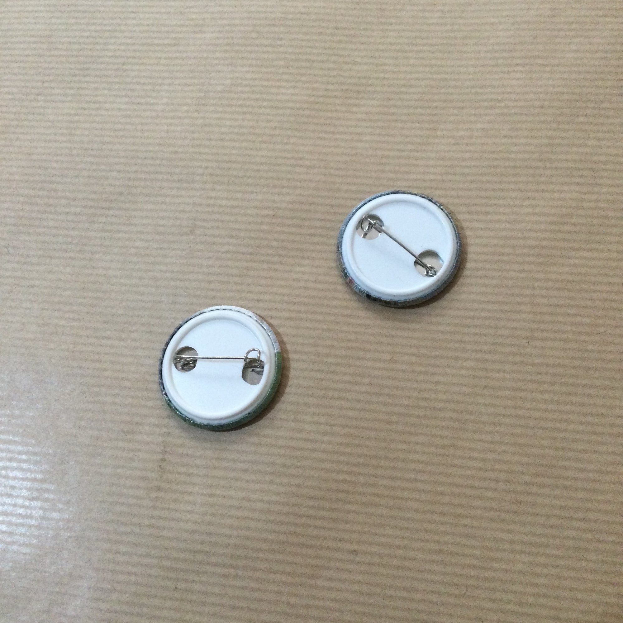 Ask me about my pottery button badge
