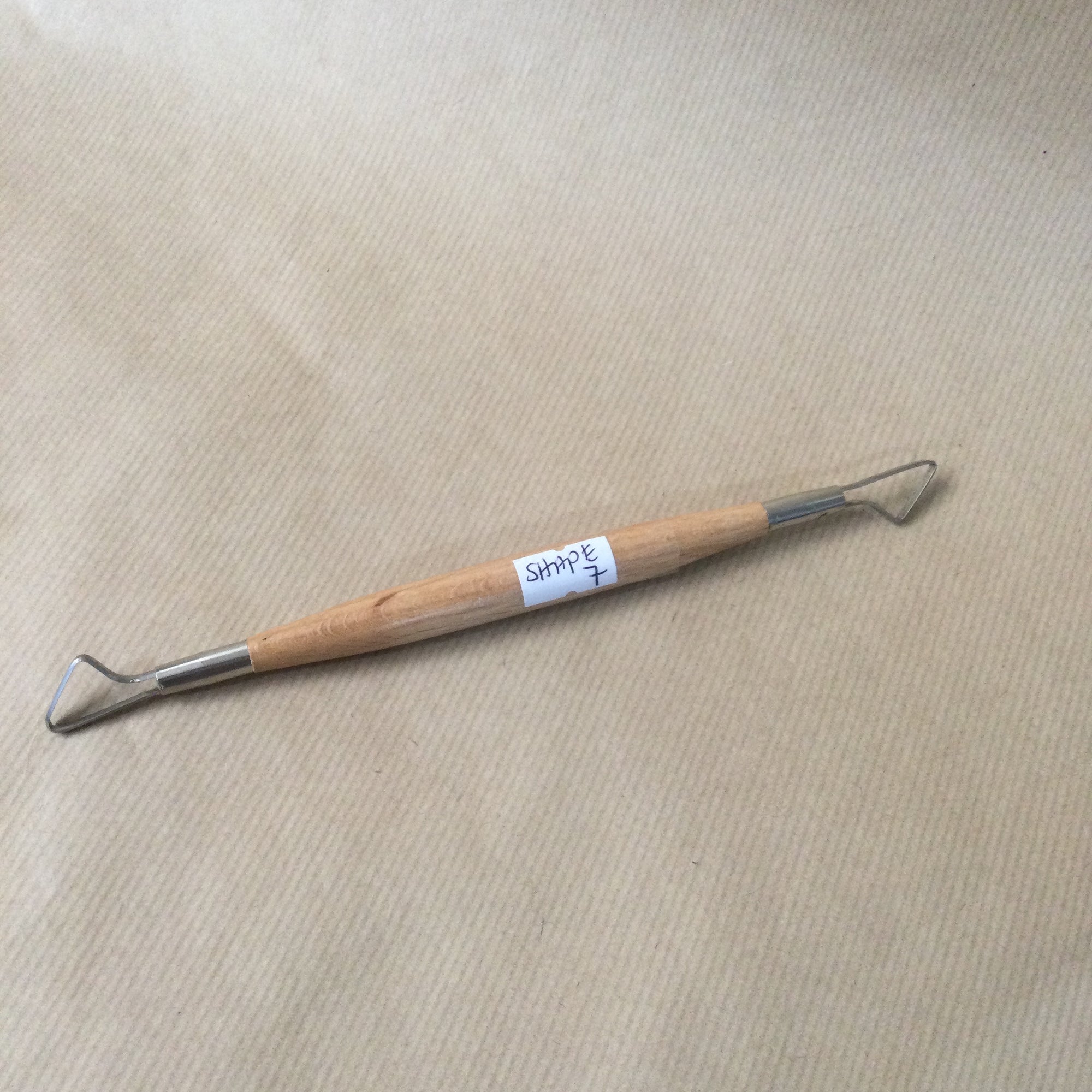 Double ended wooden handle Loop Tool
