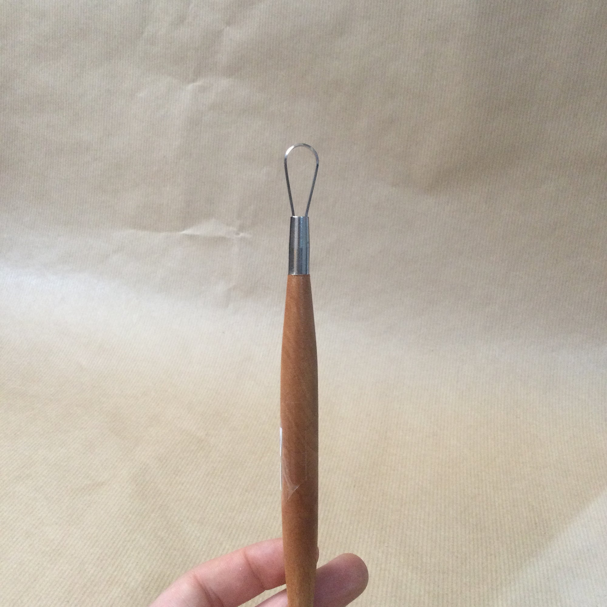 Double ended wooden handle Loop Tool