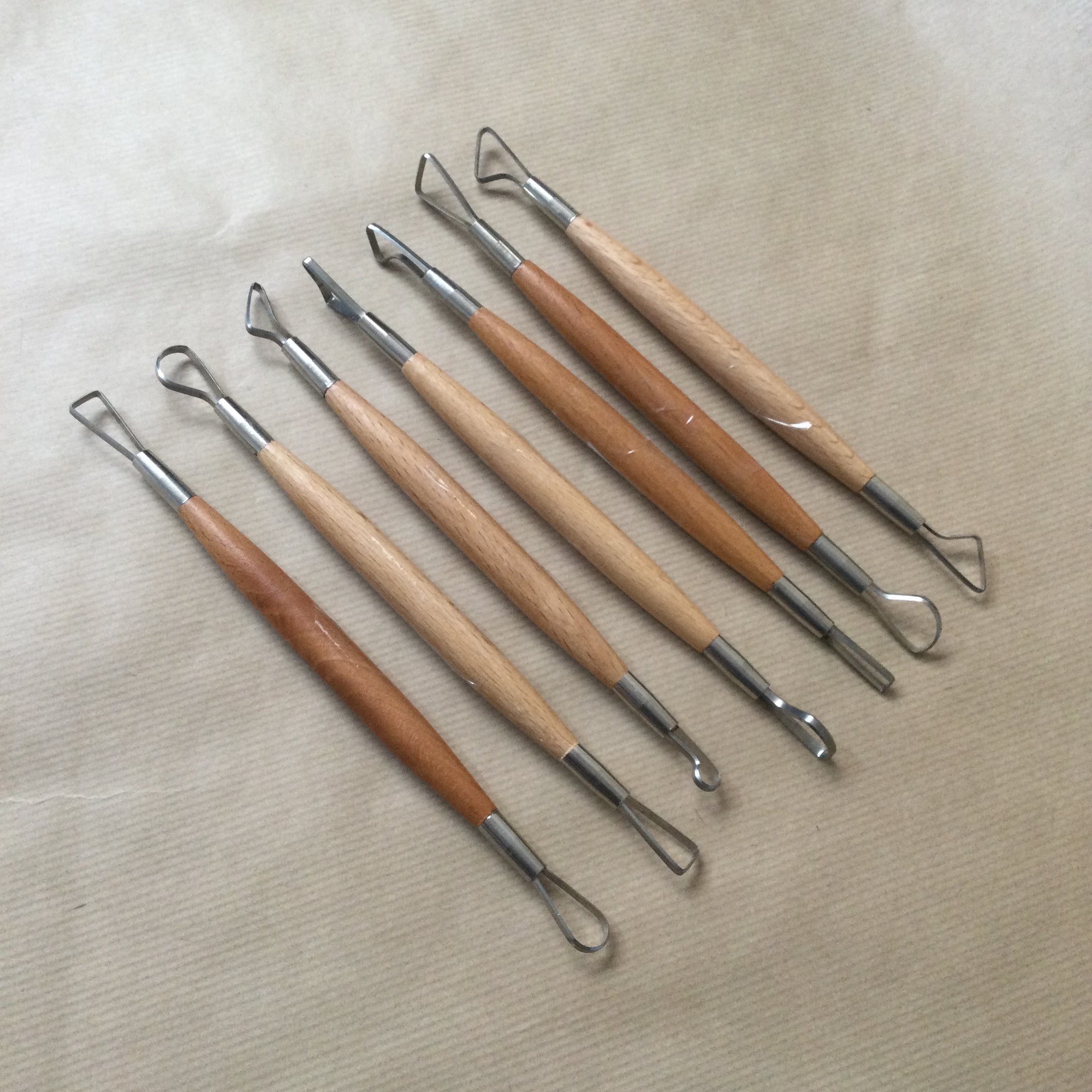 Double ended wooden handle Loop Tool
