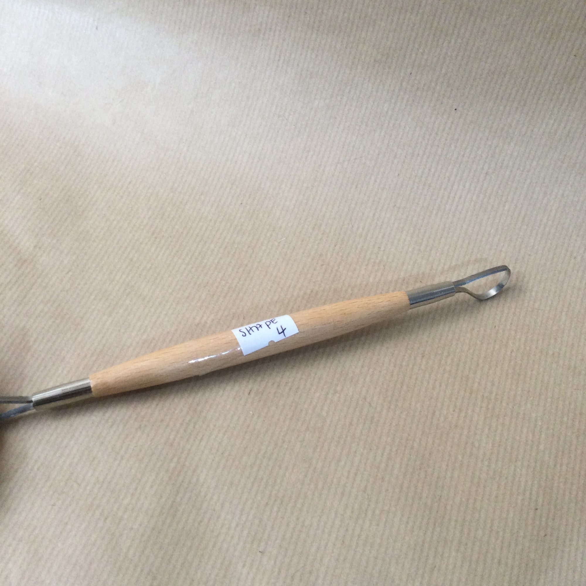 Double ended wooden handle Loop Tool