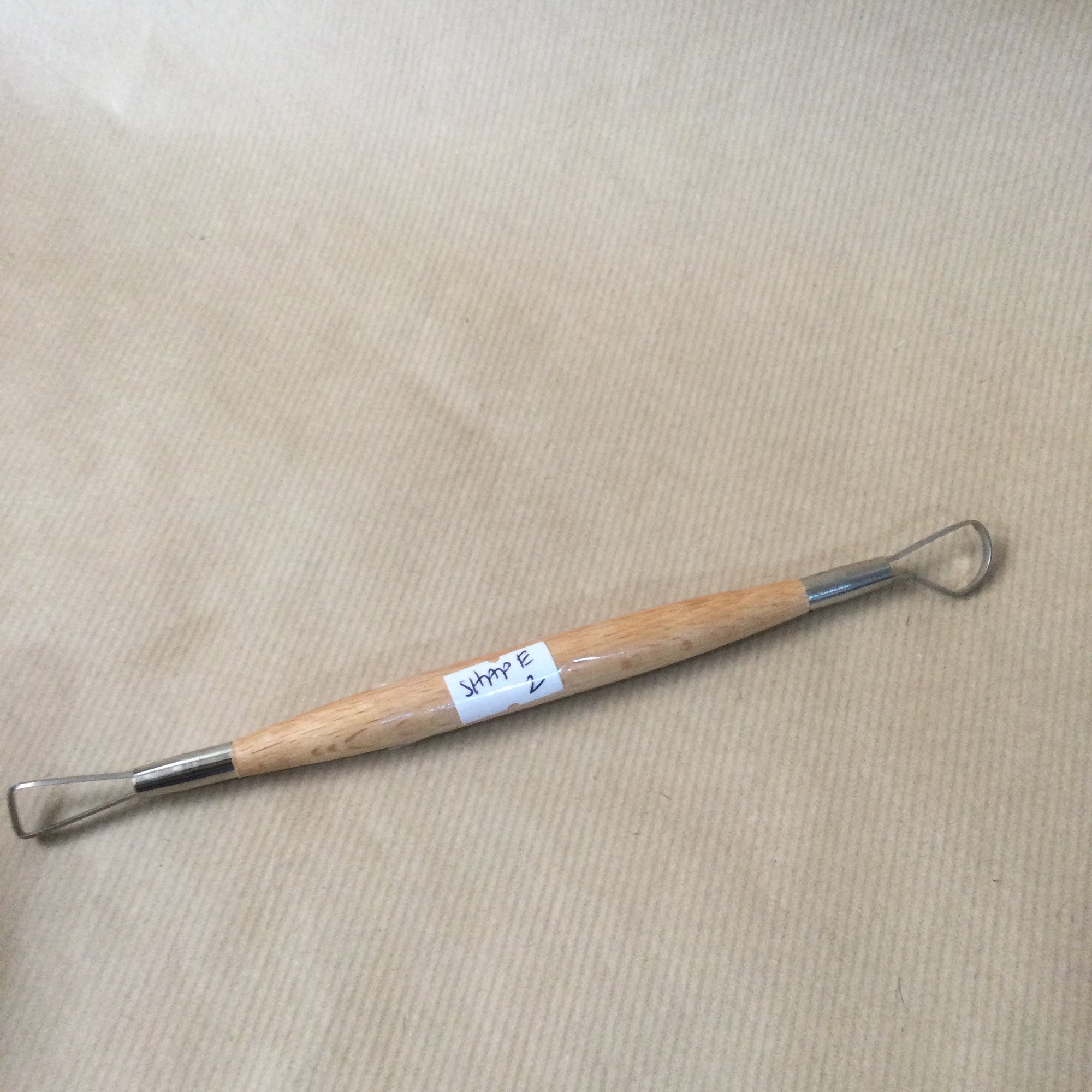 Double ended wooden handle Loop Tool