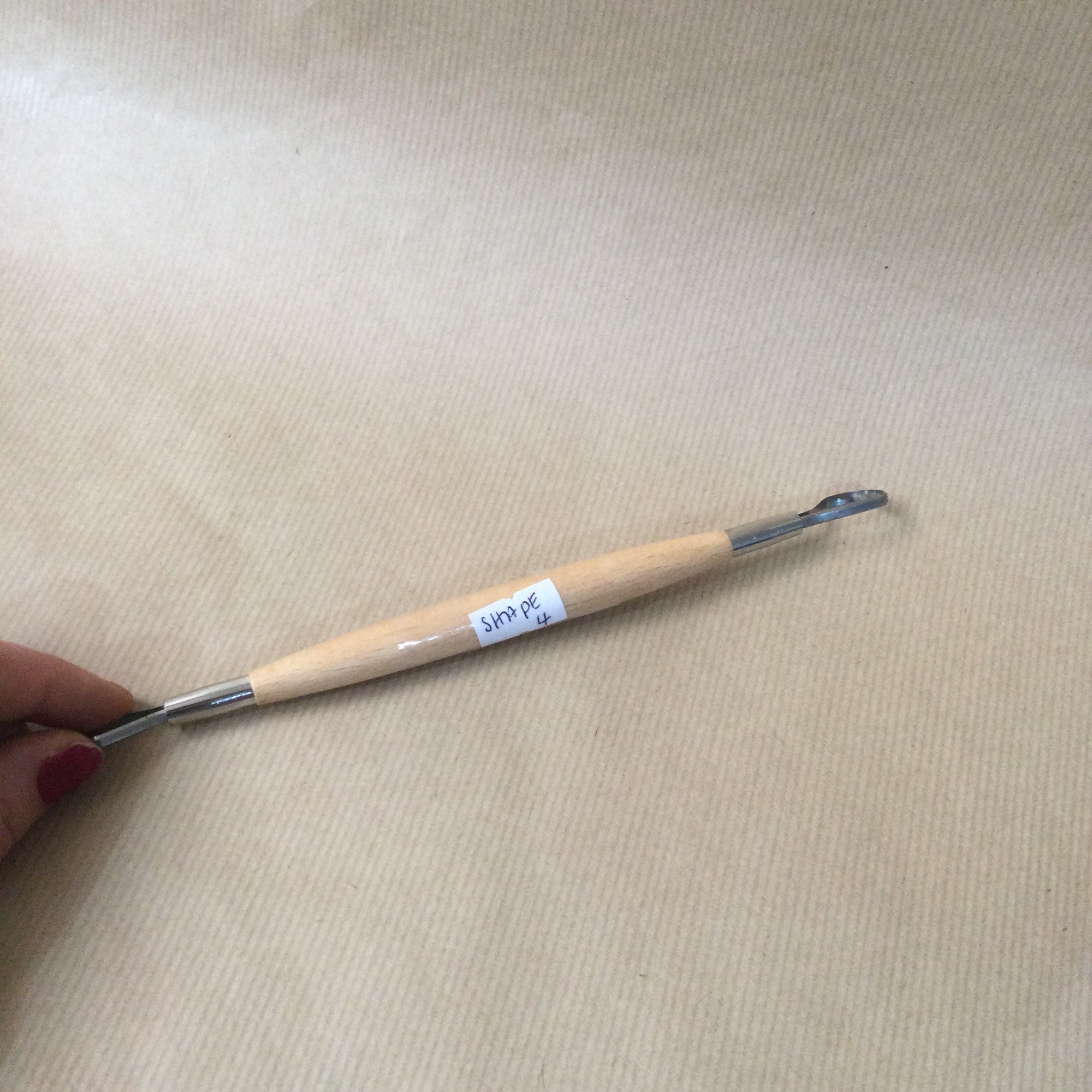 Double ended wooden handle Loop Tool