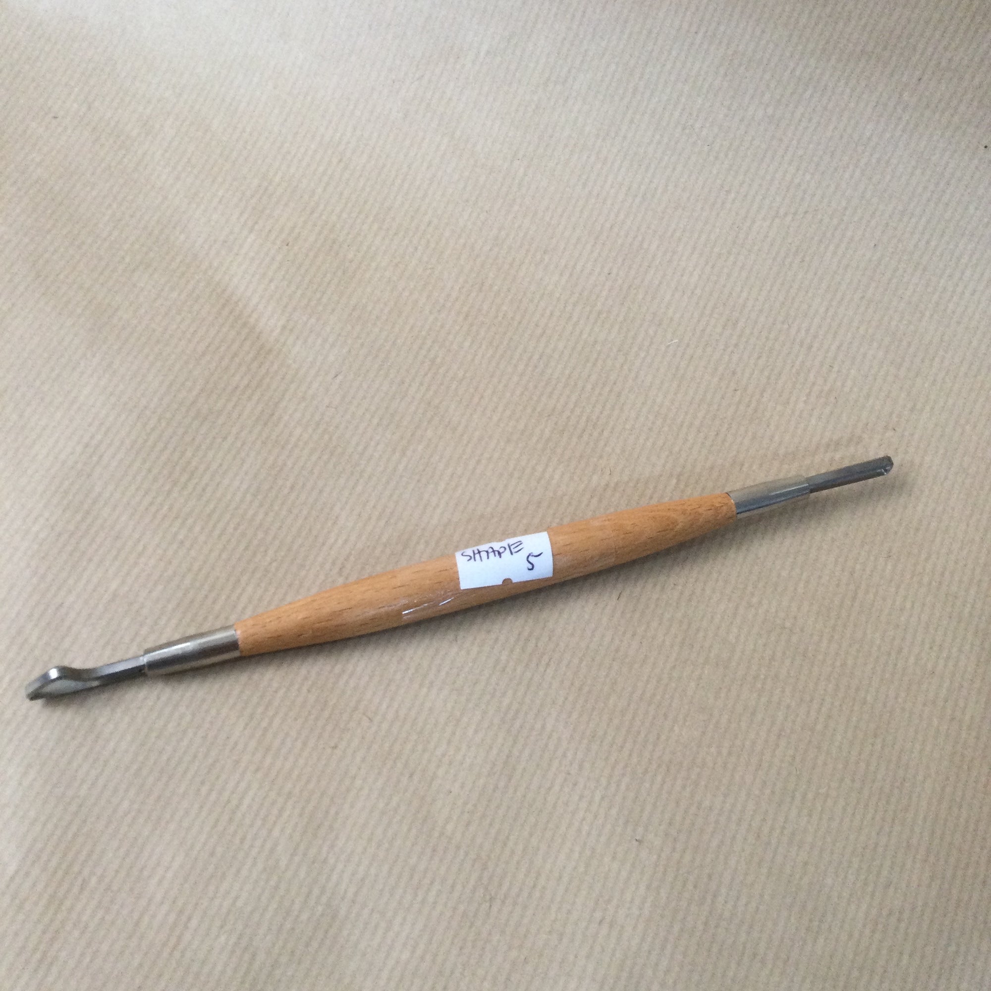 Double ended wooden handle Loop Tool