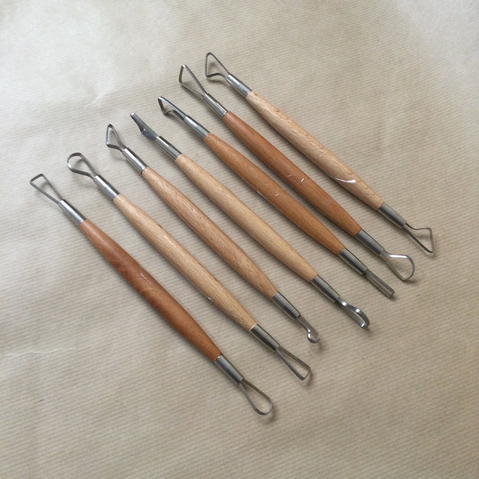 Double ended wooden handle Loop Tool
