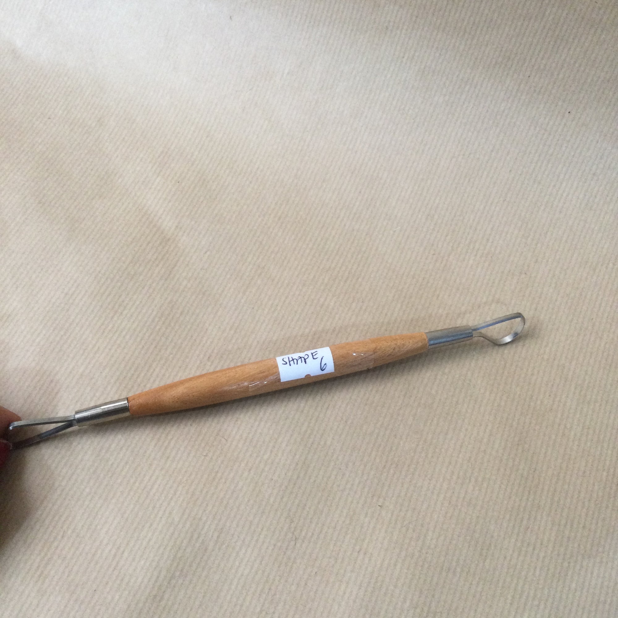 Double ended wooden handle Loop Tool