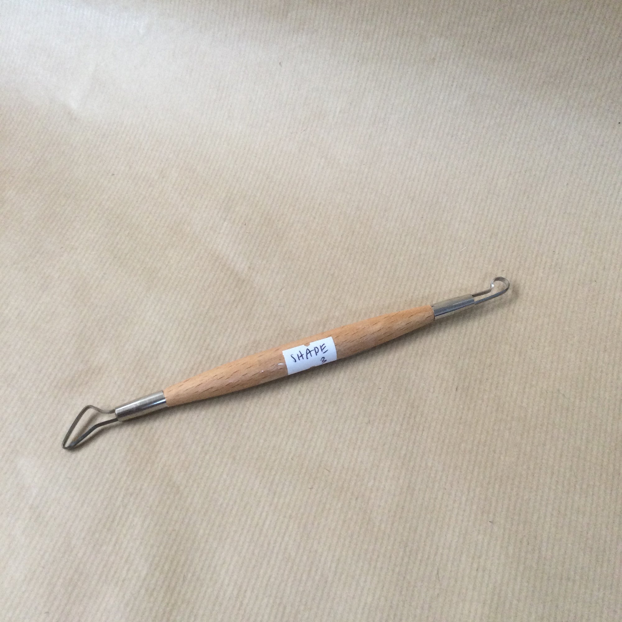 Double ended wooden handle Loop Tool