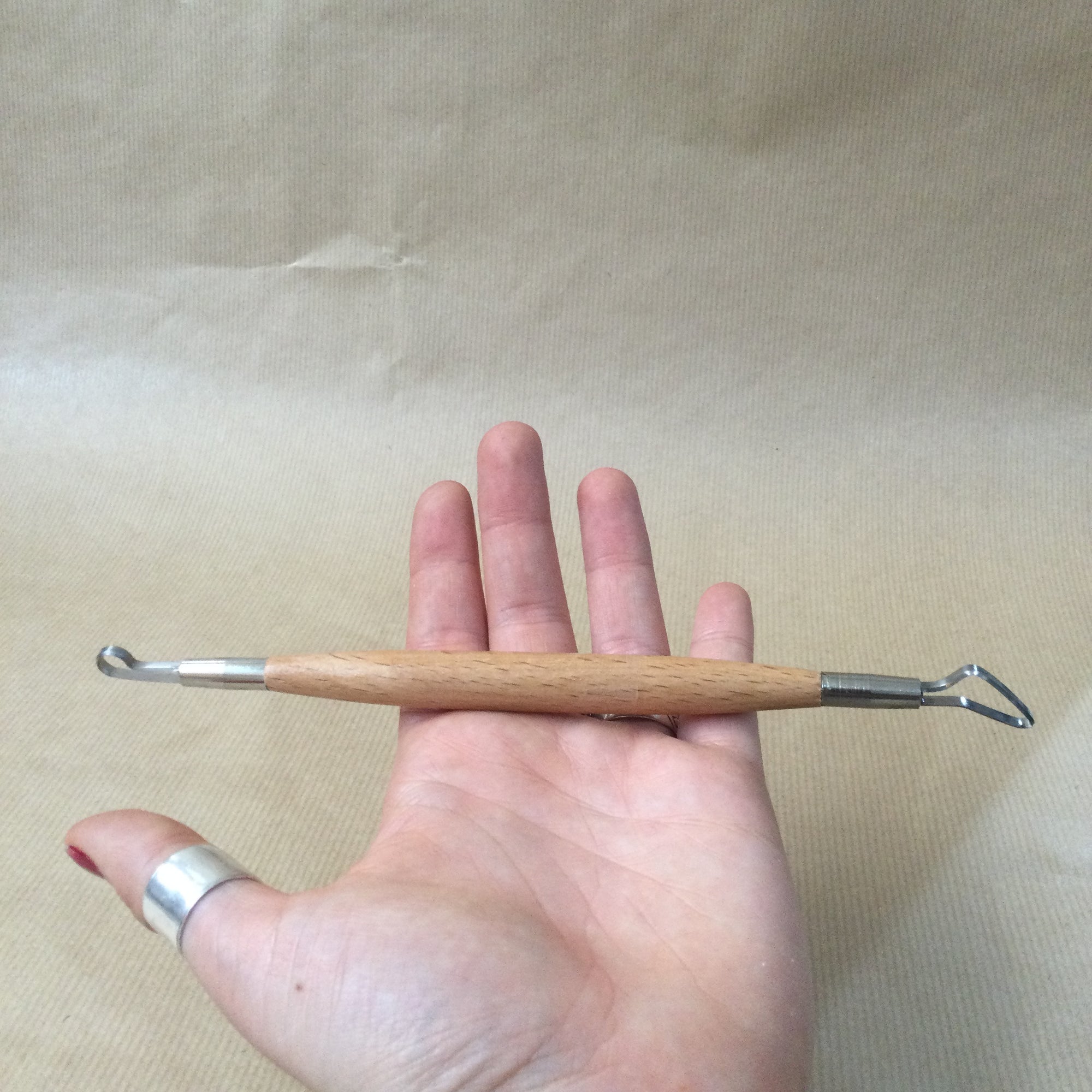 Double ended wooden handle Loop Tool