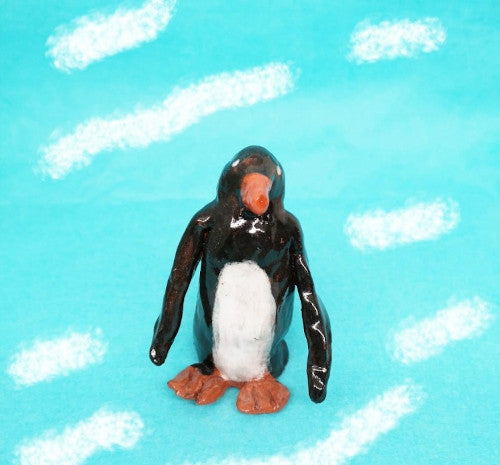A small ceramic penguin, made at Trylla Bristol